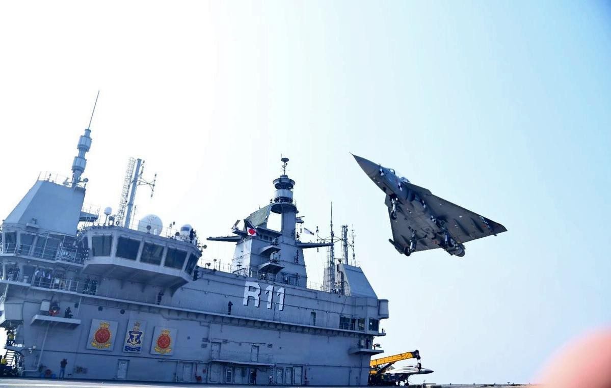 lca tejas making its maiden takeoff and landing on ins vikrant